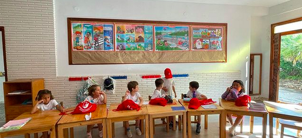 Students in a bright classroom at MDI International College, Colegio María de Icíar